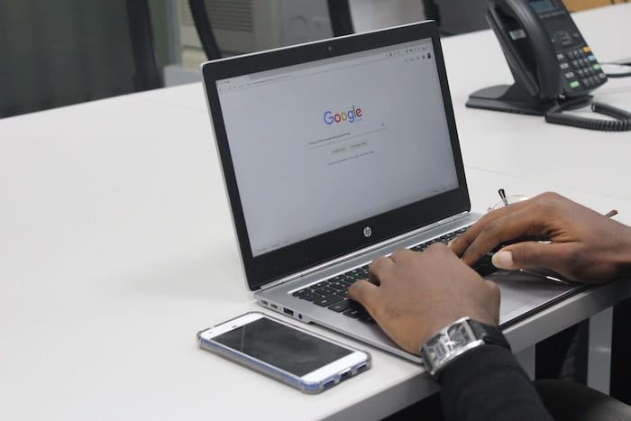 image of a person performing a google search